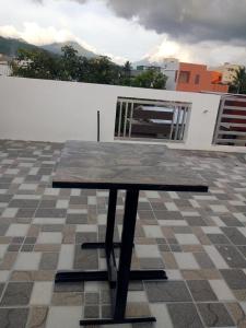 a table sitting on top of a roof at Leonor's Transient House in Polangui
