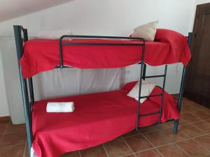 A bed or beds in a room at cortijo la laguna