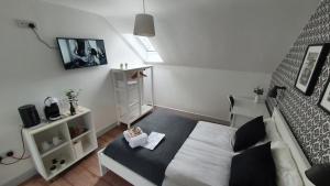 TV a/nebo společenská místnost v ubytování Pasta Factory Guest Rooms