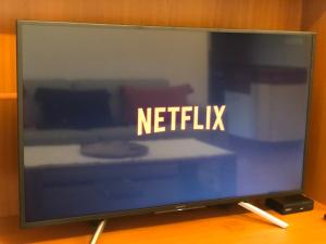 A television and/or entertainment centre at Apartment Olivia