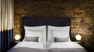 Posteľ alebo postele v izbe v ubytovaní Kalix Boutique Hotel