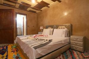 Кровать или кровати в номере Dar Chayma