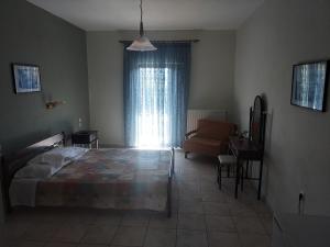 Postel nebo postele na pokoji v ubytování Miaritis rooms