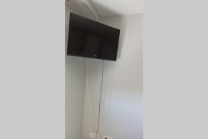 Televízia a/alebo spoločenská miestnosť v ubytovaní Apartamento en ribeira sacra. Chantada