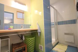 a bathroom with a sink and a shower at Gîtes Pour Tous in Dragey +52 photos