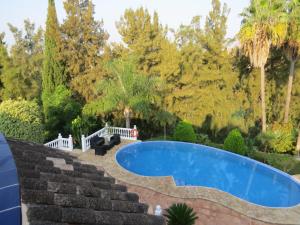 Bazén v ubytovaní Spacious 700m2 villa, Golfers paradise. alebo v jeho blízkosti