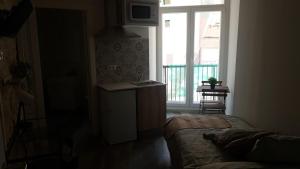 Kuchyň nebo kuchyňský kout v ubytování SERRANO Home