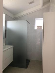 a bathroom with a shower and a toilet and a sink at Country house between Egmond aan Zee & Amsterdam in Castricum
