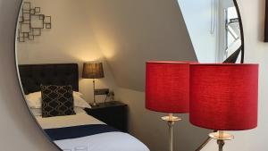 Ένα ή περισσότερα κρεβάτια σε δωμάτιο στο A Room With A View