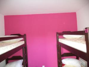 Postel nebo postele na pokoji v ubytování Hostel de los Colores