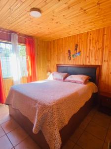 Ένα ή περισσότερα κρεβάτια σε δωμάτιο στο La Estrella del canelo