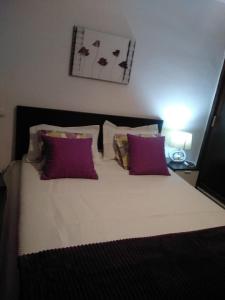 A bed or beds in a room at Amazing View Holiday Home near of the sea