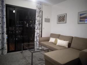 A seating area at Amazing View Holiday Home near of the sea