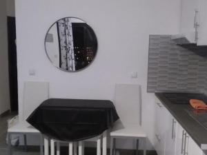 A kitchen or kitchenette at Amazing View Holiday Home near of the sea