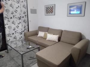 A seating area at Amazing View Holiday Home near of the sea