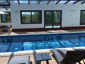 Πισίνα στο ή κοντά στο Cabañas Mazzatl 6 pax