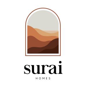 uma imagem do deserto na janela do hotel ou resort com a inscrição em SURAI Homes em Kuala Terengganu
