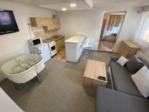 Kuchyň nebo kuchyňský kout v ubytování ARD Apartments - Levice