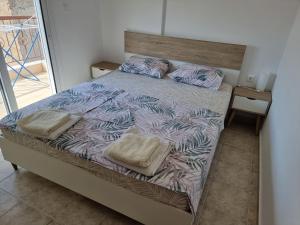 Postel nebo postele na pokoji v ubytování Lucas2 Lux Flogita apartment
