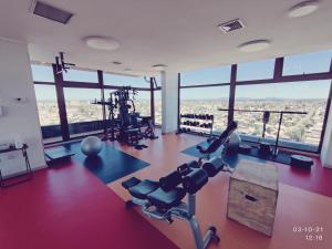 an empty gym with a view of the city at Departamento de primer Nivel in Chillán