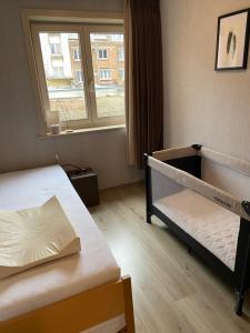 Postel nebo postele na pokoji v ubytování Ensorella