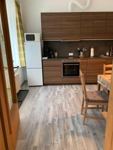 Kuchyň nebo kuchyňský kout v ubytování Ferienwohnung Schweng