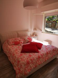 En eller flere senge i et værelse på Casa di Martina