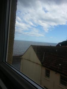 a view of the ocean from a window at Ocean's in Dawlish