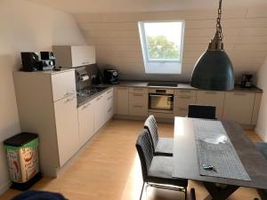 Kuchyň nebo kuchyňský kout v ubytování Boardinghouse Saargau