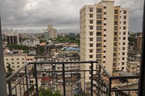 a view of a city with tall buildings at Sleep Inn Hotel - City Centre in Dar es Salaam