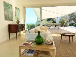 A seating area at Stunning Design Villa with unique 180º sea views