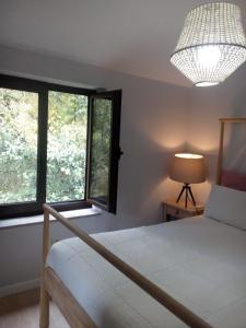 Uma cama ou camas num quarto em Quinta de Alvarenga