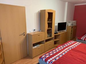 Postel nebo postele na pokoji v ubytování Apartmán Kvapil Lipová-lázně