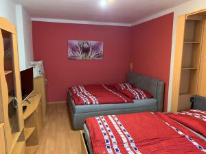 Postel nebo postele na pokoji v ubytování Apartmán Kvapil Lipová-lázně