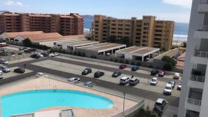 arial view of a parking lot with cars parked at Relajo y tranquilidad a pasos del mar in La Serena