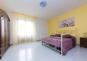 Postel nebo postele na pokoji v ubytování B&B La Casa nel Borgo