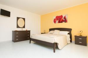 Postel nebo postele na pokoji v ubytování B&B La Casa nel Borgo