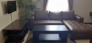 Χώρος καθιστικού στο Comfy & Spacious Apartments