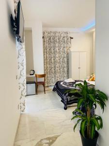 A television and/or entertainment centre at Santa Maria Accommodation