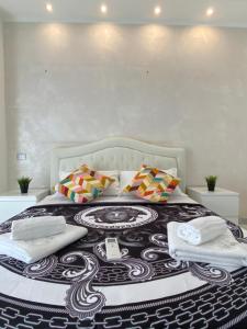 A bed or beds in a room at Santa Maria Accommodation