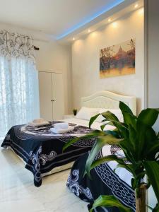 A bed or beds in a room at Santa Maria Accommodation