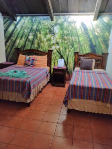 Postel nebo postele na pokoji v ubytování Hotel Vista al Cerro + 115 fotografií