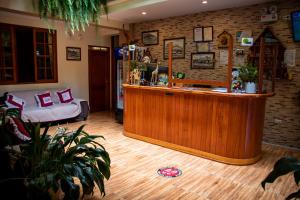 a bar in a room with a counter at Hospedaje Chimy in Oxapampa