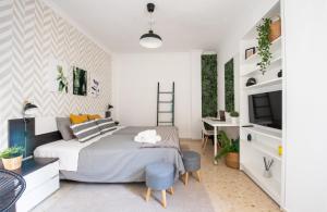 TV a/nebo společenská místnost v ubytování Nordik Rooms Urban - Trinidad "Copenhague"