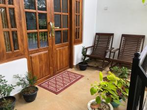 Posezení v ubytování Kandyan Lounge