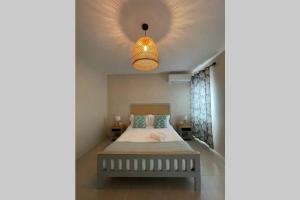 Postel nebo postele na pokoji v ubytování Bois Mapou Self Catering Apartments Unit 102