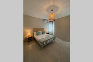 Postel nebo postele na pokoji v ubytování Bois Mapou Self Catering Apartments Unit 102