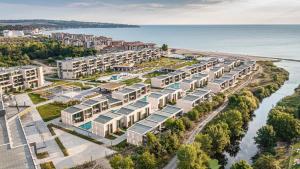 an aerial view of a resort complex next to the water at HVD Reina del Mar - Premium Spa Service & Free Parking in Obzor