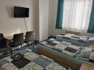 Кровать или кровати в номере SPORTHOTEL Milevsko