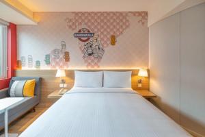 Postel nebo postele na pokoji v ubytování ibis Mumbai Vikhroli - An Accor Brand